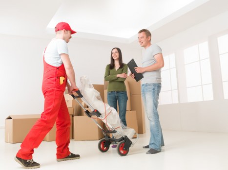 Packed household boxes ready for loading by house removalists