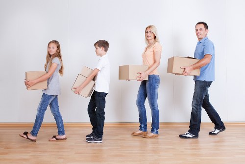 Office movers loading business furniture for a Chasecross relocation
