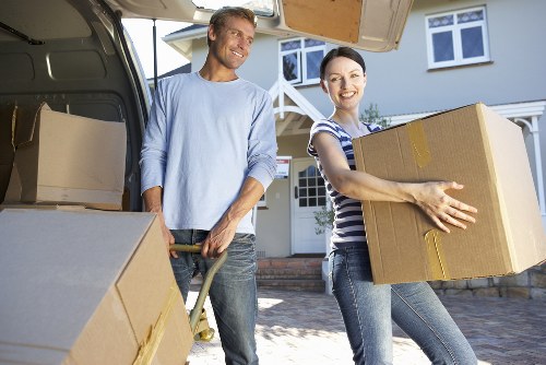 Removal team transporting furniture between Chasecross properties