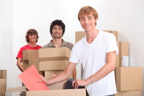 Business relocation planning with boxes and workplace equipment in Chasecross