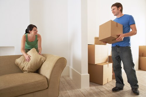 Boxes, furniture, and moving supplies prepared for a Chasecross move